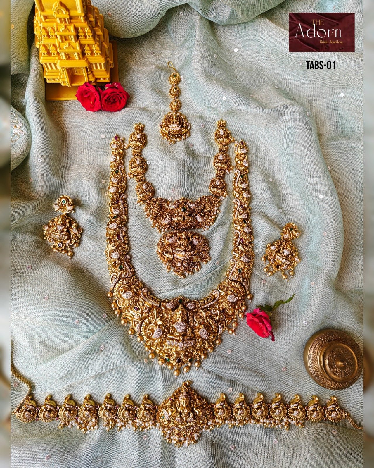 A complete gold-tone temple-inspired bridal jewellery presentation